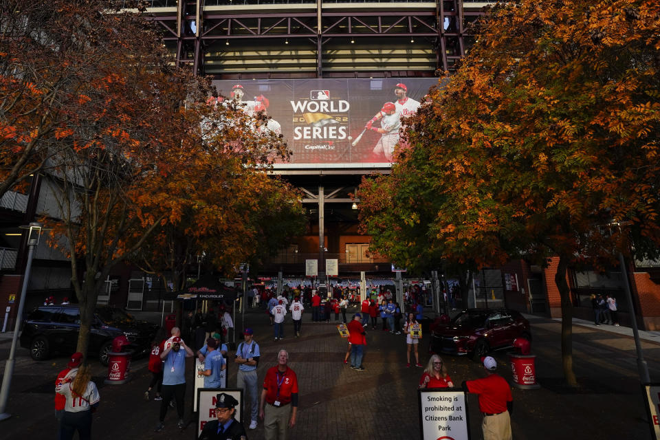 Fans arrive for Game 4 of baseball's World Series between the Houston Astros and the Philadelphia Phillies on Wednesday, Nov. 2, 2022, in Philadelphia. (AP Photo/Chris Szagola)