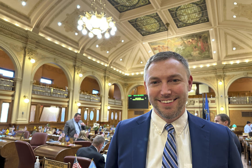 South Dakota Republican Rep. Jon Hansen stands in the House of Representatives in the state Capitol in Pierre, S.D., on Wednesday, Feb. 21, 2024. Hansen opposes a proposed ballot initiative that would place abortion rights in the South Dakota Constitution. (AP Photo/Jack Dura)