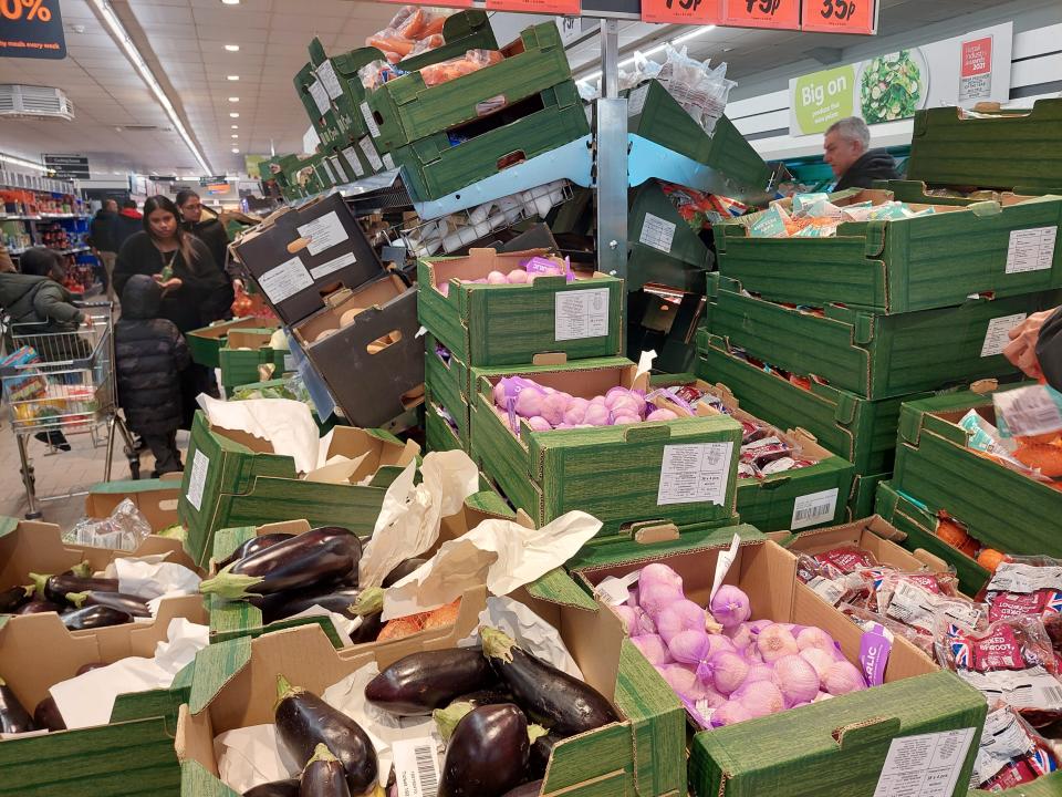 Lidl messy pile of crates of fruit & veg