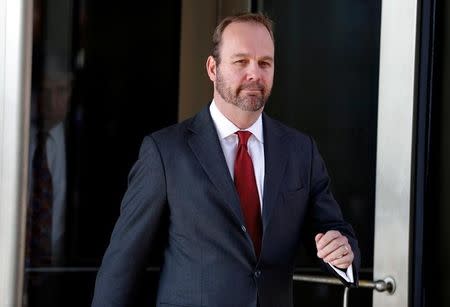 FILE PHOTO: Rick Gates, former campaign aide to U.S. President Donald Trump, departs after a bond hearing at U.S. District Court in Washington, U.S., December 11, 2017. REUTERS/Joshua Roberts/File Photo
