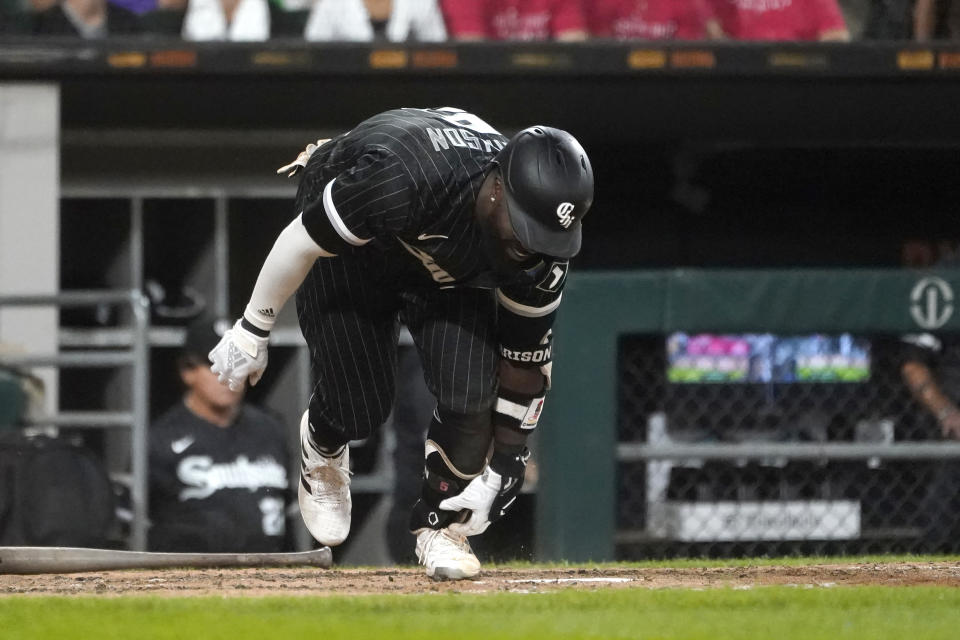 Chicago White Sox's Josh Harrison slaps the ground after his inning-ending popup during the seventh inning of the team's baseball game against the Houston Astros on Monday, Aug. 15, 2022, in Chicago. (AP Photo/Charles Rex Arbogast)