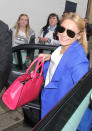 Celebrities in neon fashion: Sam Faiers completed her outfit with a neon pink handbag.<br><br>[WENN]