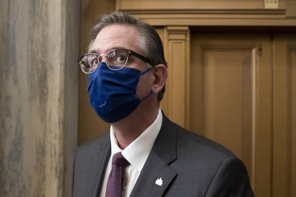 Bruce Castor, lawyer for former President Donald Trump, waits for an elevator during a break in the third day of the second impeachment trial of Trump in the Senate, Thursday, Feb. 11, 2021, in Washington. (Michael Reynolds/Pool via AP)