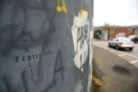 Writing is seen on the Peace Wall in Belfast, Northern Ireland January 19, 2017. REUTERS/Clodagh Kilcoyne