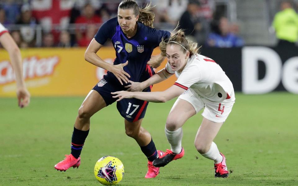 Tobin Heath caused trouble down England's left - John Raoux/AP