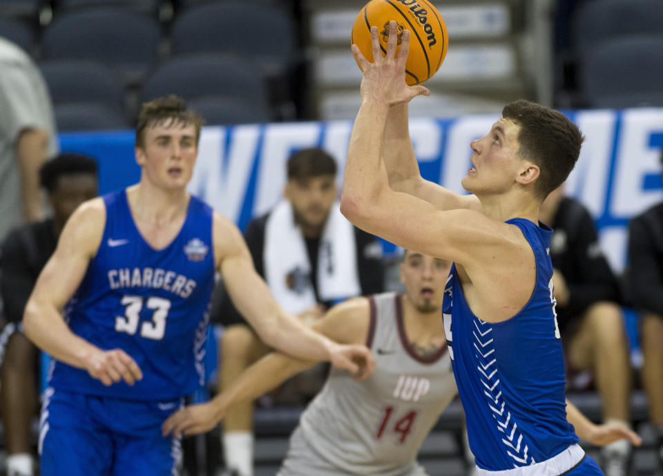 FILE - Hillsdale's Patrick Cartier shoots against Indiana of Pennsylvania during a quarterfinal in the NCAA Division II men's college basketball tournament in Evansville, Ind., Tuesday, March 22, 2022. Cartier caught the attention of Colorado State. (Macabe Brown/Evansville Courier & Press via AP, File)