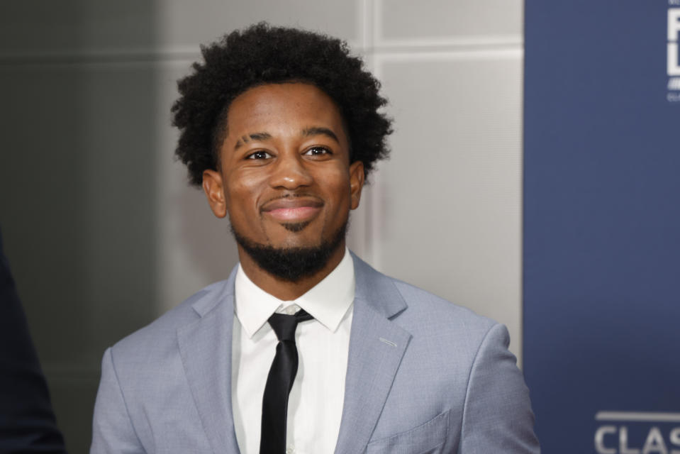 NASCAR Craftsman Truck Series driver Rajah Caruth arrives at the 2024 iNASCAR Hall of Fame induction ceremony in Charlotte, N.C., Friday, Jan. 19, 2024. The 21-year-old student at Winston-Salem State has cracked into NASCAR's national-level series racing and on Friday, March 1, 2024, won the Truck Series race at Las Vegas Motor Speedway. (AP Photo/Nell Redmond)