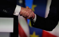 <p>President Donald Trump, left, shakes hands with French President Emmanuel Macron after a press confrence at the Elysee Palace in Paris, Thursday, July 13, 2017. Trump says the two nations have “occasional disagreements” but that doesn’t disrupt a friendship that dates to the American Revolution. (Photo: Markus Schreiber/AP) </p>