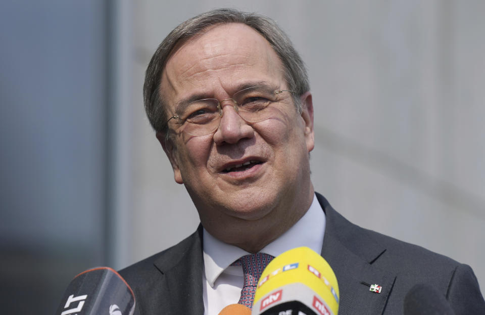 Armin Laschet, chairman of the German Christian Democratic party (CDU), addresses the media during a statement in front of the party's headquarters in Berlin, Germany, Monday, April 19, 2021. (AP Photo/Michael Sohn)