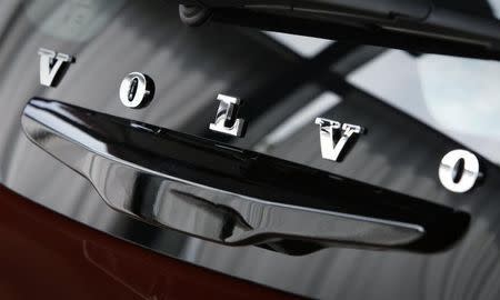 Volvo's corporate logo is seen on the rear hatch of a Volvo C30 in a showroom near the Volvo Car Corporation Headquarters in Gothenburg May 20, 2010. REUTERS/Bob Strong