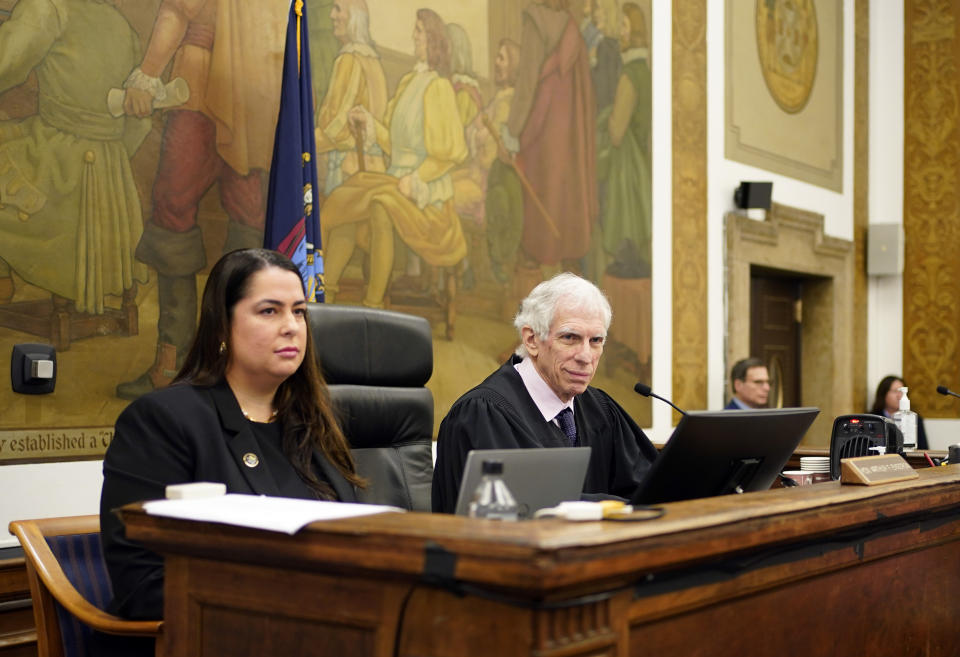Judge Arthur Engoron, right, and principal law clerk Allison Greenfield sit on the bench during former President Donald Trump's civil business fraud trial at New York Supreme Court, Tuesday, Oct. 17, 2023, in New York. (AP Photo/Seth Wenig, Pool)