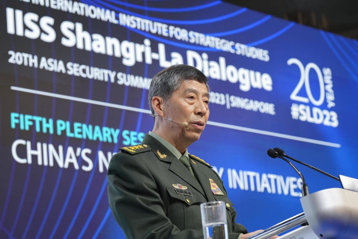 Chinese Defense Minister Gen. Li Shangfu delivers his speech on the last day of the 20th International Institute for Strategic Studies (IISS) Shangri-La Dialogue, Asia's annual defense and security forum, in Singapore, Sunday, June 4, 2023. (AP Photo/Vincent Thian)