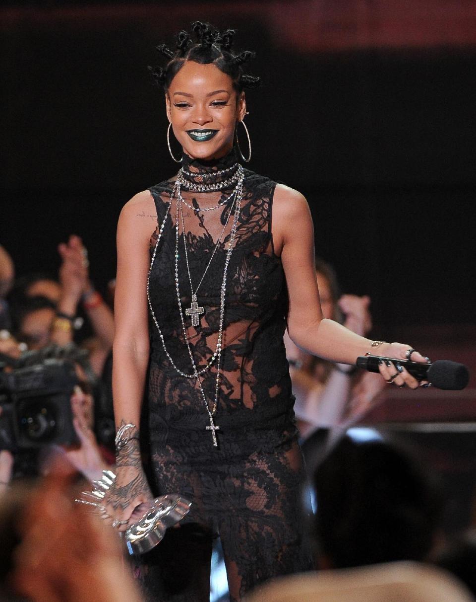 Rihanna accepts the award for song of the year for "Stay" at the iHeartRadio Music Awards at the Shrine Auditorium on Thursday, May 1, 2014, in Los Angeles. (Photo by Chris Pizzello/Invision/AP)