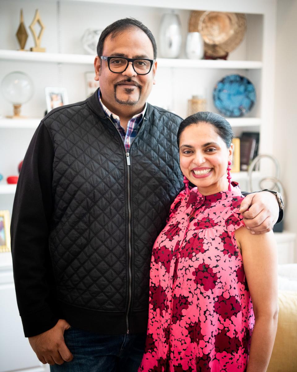 Vivek Deora and Maneet Chauhan stand in their home in Franklin on March 21, 2020.