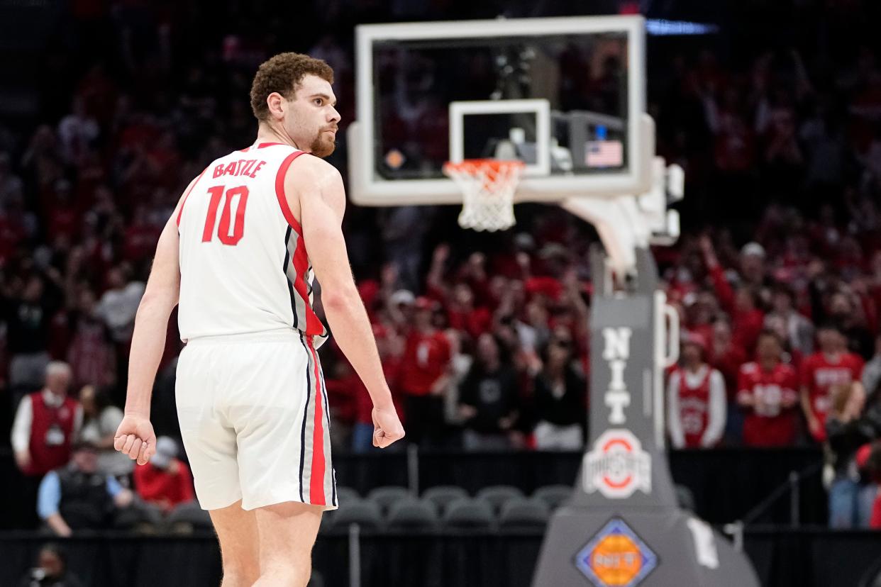 Mar 26, 2024; Columbus, OH, USA; Ohio State Buckeyes forward Jamison Battle (10) celebrates a three pointer during the second half of the NIT quarterfinals against the Georgia Bulldogs at Value City Arena. Ohio State lost 79-77.