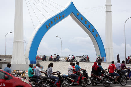 FILE PHOTO: Maldivians travel on the China-funded Sinamale bridge in Male, Maldives September 18, 2018. REUTERS/Ashwa Faheem/File Photo