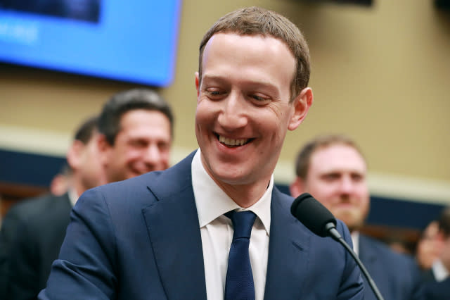 Facebook co-founder, Chairman and CEO Mark Zuckerberg arrives to testify before the House Energy and Commerce Committee in the Rayburn House Office Building on Capitol Hill April 11, 2018 in Washington, DC. This is the second day of testimony before Congress by Zuckerberg, 33, after it was reported that 87 million Facebook users had their personal information harvested by Cambridge Analytica, a British political consulting firm linked to the Trump campaign.