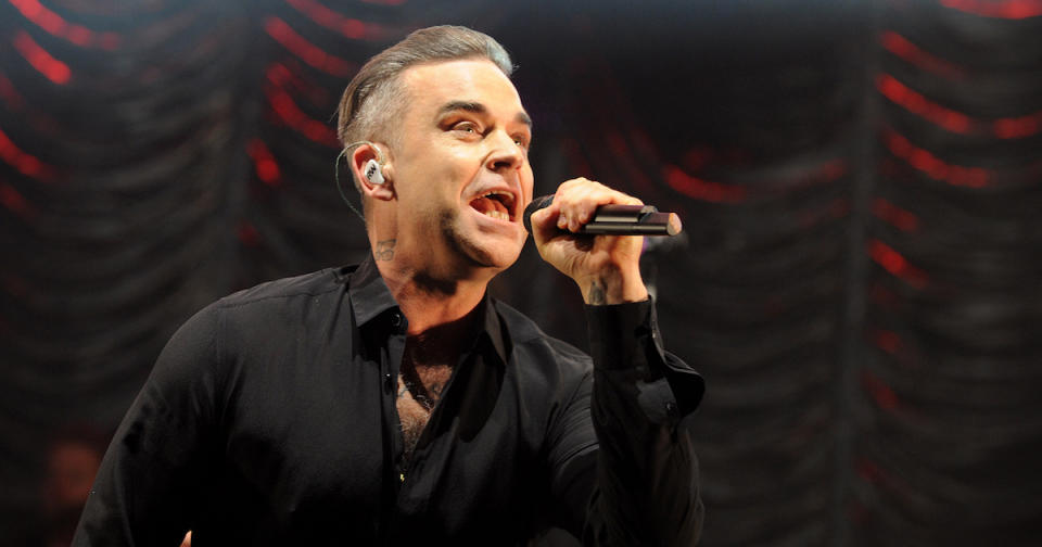 Robbie performs on stage at Key 103 Christmas Live at Manchester Arena (Copyright: Getty/Shirlaine Forrest)