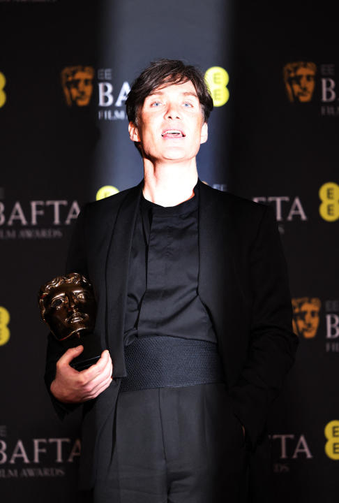 Cillian Murphy poses in the winner's room with his award for Leading Actor for 