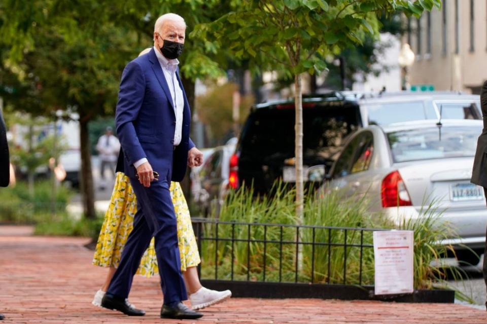 President Joe Biden and first lady Jill Biden arrive for church at Holy Trinity Catholic Church in the Georgetown section of Washington, Saturday, Aug. 21. - Credit: AP