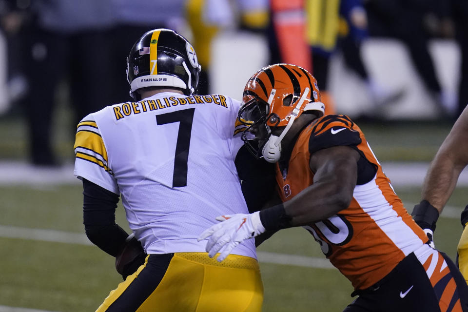 Cincinnati Bengals' Carl Lawson (58) sacks Pittsburgh Steelers quarterback Ben Roethlisberger (7) during the first half of an NFL football game, Monday, Dec. 21, 2020, in Cincinnati. (AP Photo/Michael Conroy)