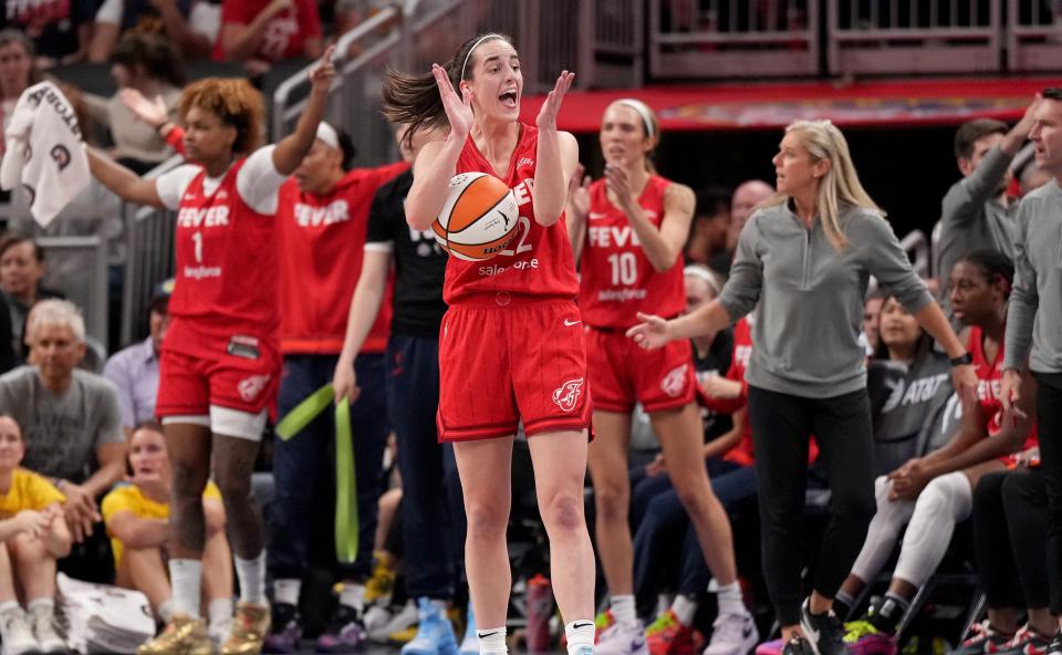 INDIANAPOLIS, INDIANA - SEPTEMBER 13: Caitlin Clark #22 of the Indiana Fever reacts to a call from the referee during the first half of a game against the Las Vegas Aces at Gainbridge Fieldhouse on September 13, 2024 in Indianapolis, Indiana. NOTE TO USER: User expressly acknowledges and agrees that, by downloading and or using this photograph, User is consenting to the terms and conditions of the Getty Images License Agreement. (Photo by Emilee Chinn/Getty Images) ORG XMIT: 776136677 ORIG FILE ID: 2171820230