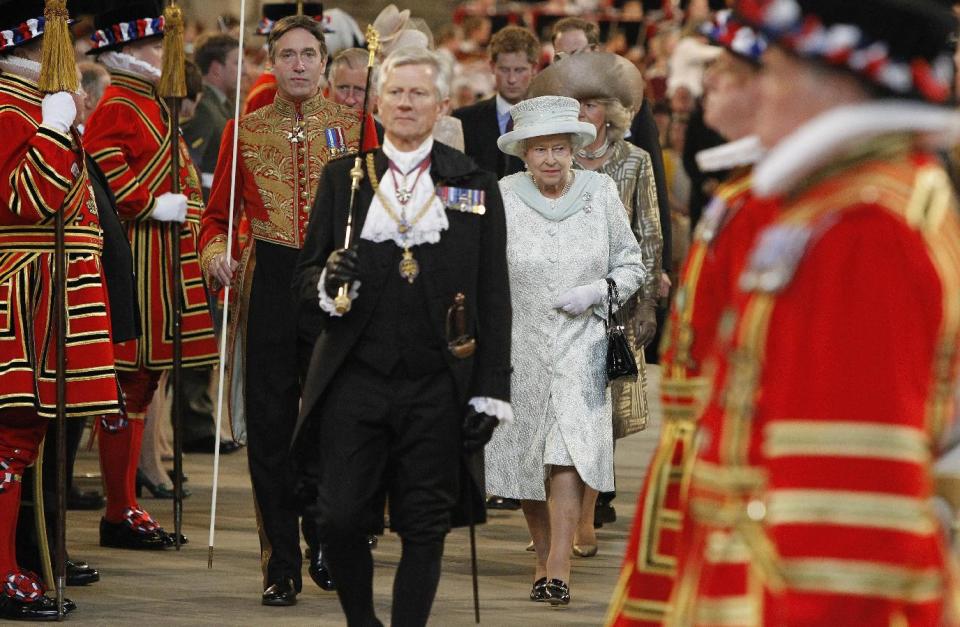 Britain's Queen Elizabeth II leaves Westminster Hall in London after a Diamond Jubilee Luncheon given for The Queen, Tuesday June 5, 2012 . Crowds cheering "God save the queen!" and pealing church bells greeted Queen Elizabeth II on Tuesday as she arrived for a service at St. Paul's Cathedral on the last of four days of celebrations of her 60 years on the throne. (AP Photo/Peter Byrne/Pool)