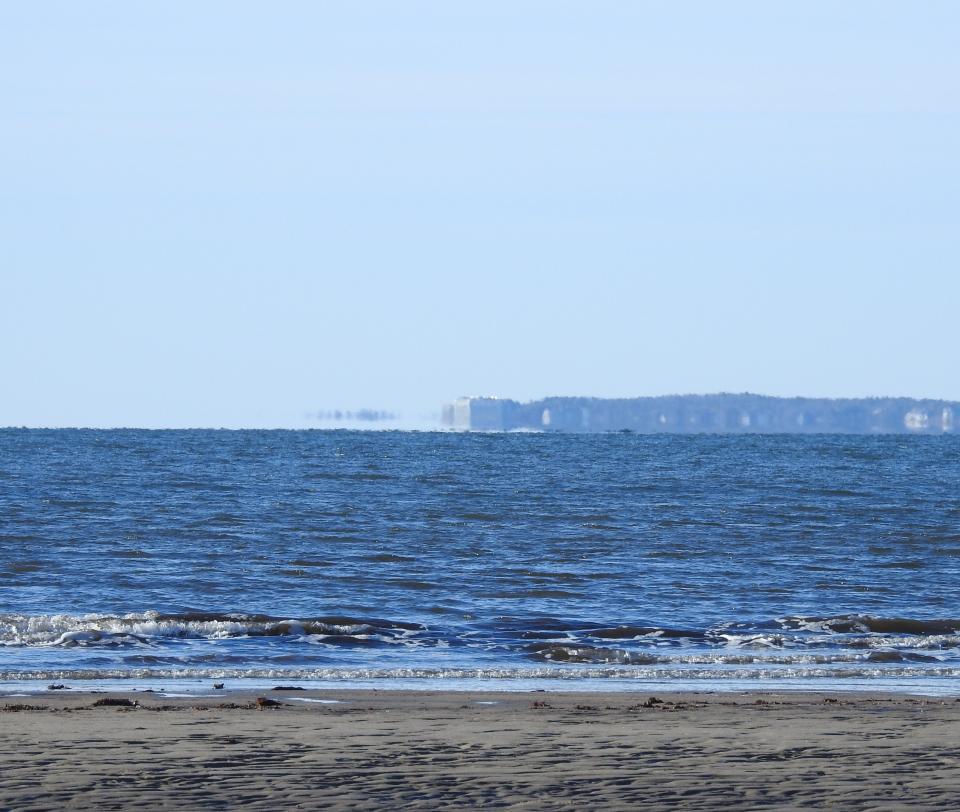 Fata Morgana as seen from Parsons Beach in Kennebunk, Maine, looking towards Mount Agamenticus.