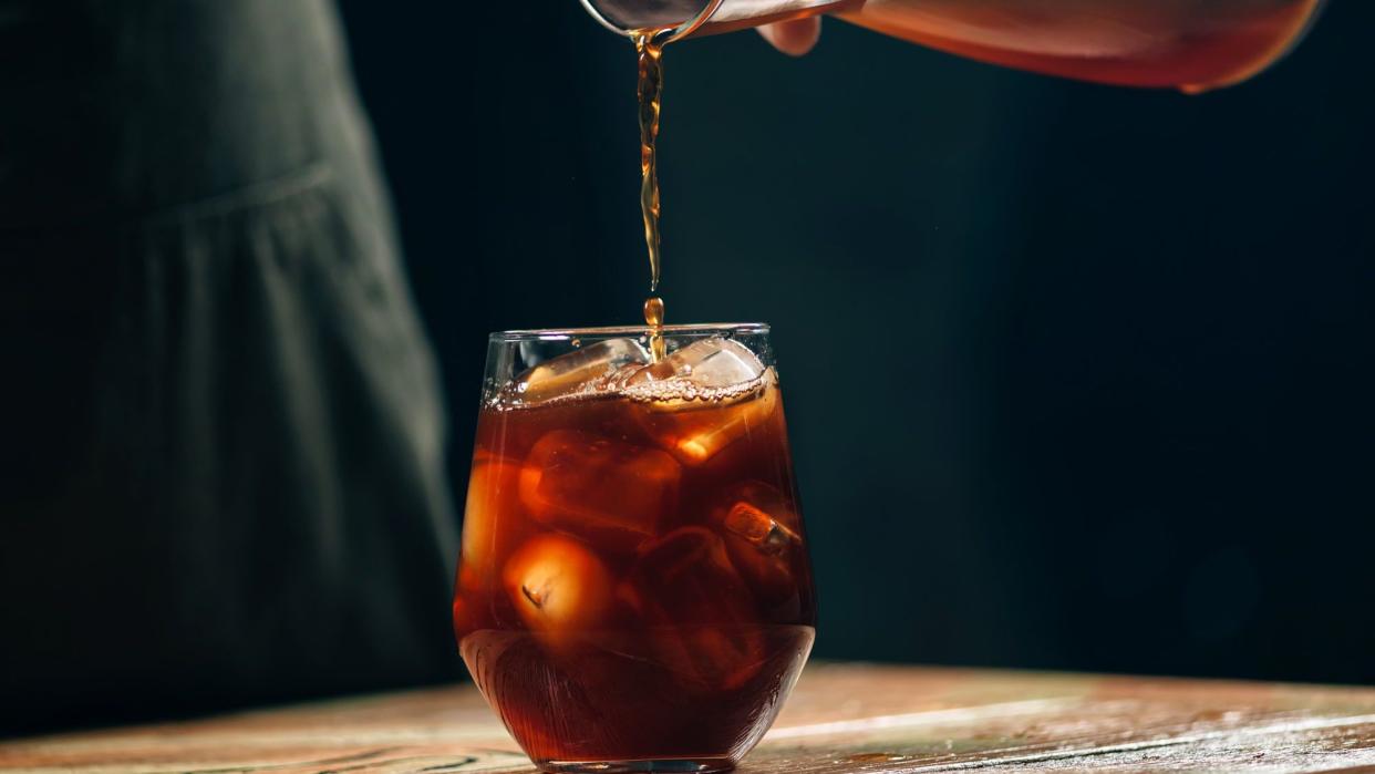 Cold brew being poured into a glass