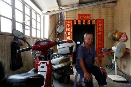 A villager undertakes a health research project on Shazai Island which has with a field studio of Sun Yat-Sen University-Michigan State University Joint Center of Vector Control for Tropical Disease, the world’s largest "mosquito factory" which breeds millions of bacteria-infected mosquitoes, in the fight against the spread of viruses such as dengue and Zika, in Guangzhou, China July 28, 2016. REUTERS/Bobby Yip