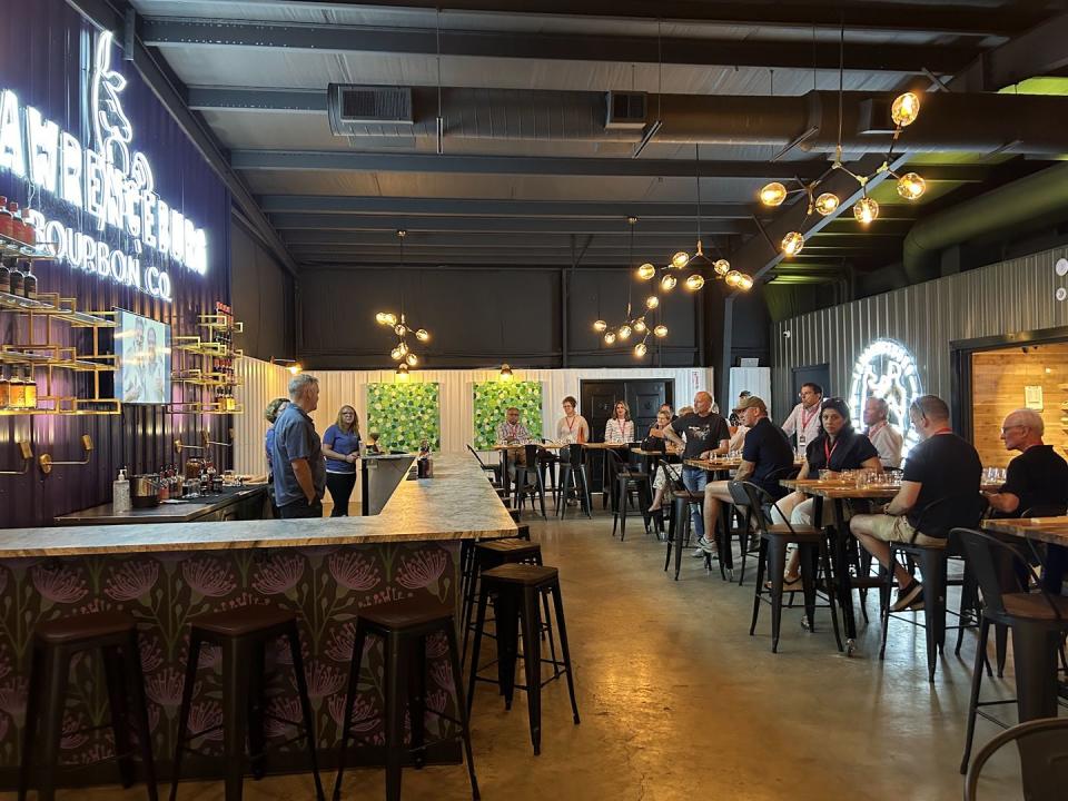 a group of people sitting at tables