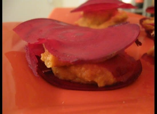 Beet “Ravioli” Stuffed with Sweet Root Vegetable Mash    "This beet "ravioli" with sweet root vegetable puree is my favorite way to usher in the fall season. It shows off the best of fall produce, it's simple, and it's easy to modify according to taste. It also happens to be an easy way to introduce friends or family with conventional foodie tastes to the fun world of semi-raw and vegan eating." (Full Recipe <a href="http://www.choosingraw.com/autumn-dinner-party/" target="_hplink">Here</a>)    