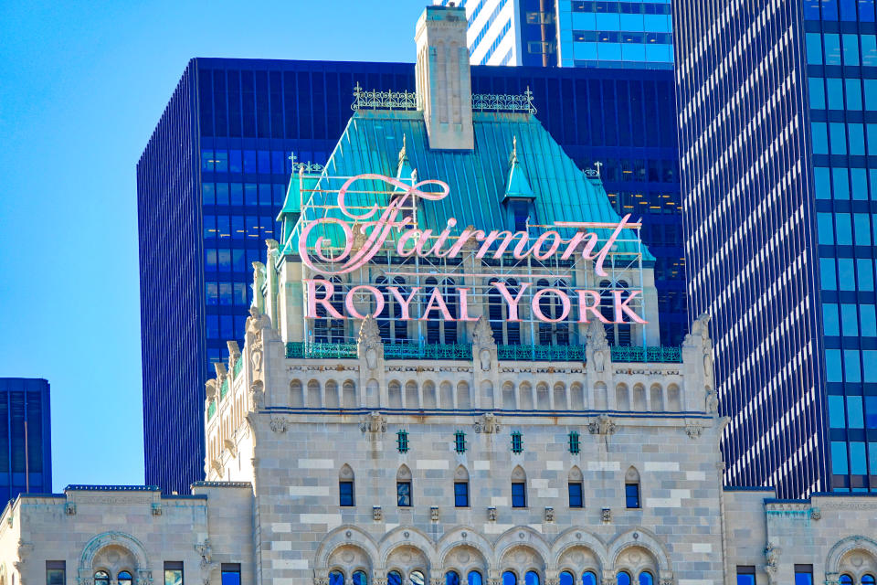 Toronto, Canada -June 16: Famous Landmark Fairmont Royal York Hotel in Toronto facing Ontario Lake harbor