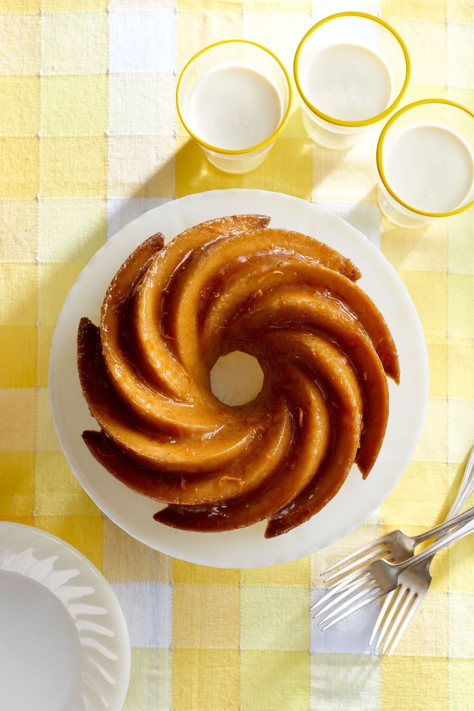 <p>If mom loves a good pound cake, this gorgeous citrusy bundt will knock her socks off! With citrusy orange flavor and a sweet honey-butter glaze, this cake is a sweet way to treat mom on Mother's Day.</p><p><strong><a href="https://www.countryliving.com/food-drinks/recipes/a281/orange-blossom-bundt-recipe-clx0315/" rel="nofollow noopener" target="_blank" data-ylk="slk:Get the recipe for Orange Blossom Bundt Cake;elm:context_link;itc:0;sec:content-canvas" class="link ">Get the recipe for Orange Blossom Bundt Cake</a>.</strong></p>