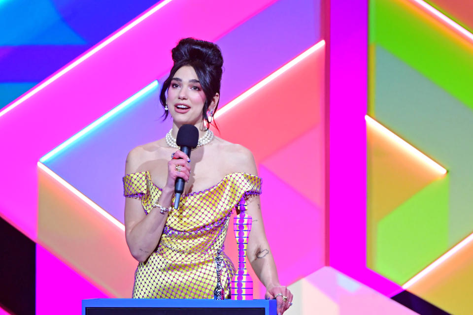 Dua Lipa accepts the award for Female Solo Artist during the Brit Awards 2021 at the O2 Arena, London. Picture date: Tuesday May 11, 2021.