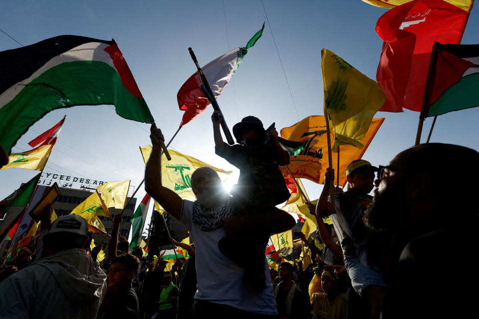 FILE PHOTO: Lebanon's Hezbollah supporters gather to attend a ceremony to honour killed fighters, in Beirut