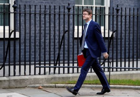 FILE PHOTO: Britain's Secretary of State for Business Greg Clark is seen outside of Downing Street in London, Britain, February 19, 2019. REUTERS/Peter Nicholls