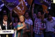 Chilean presidential candidate Michelle Bachelet celebrates after winning Chile's presidential elections, in Santiago, December 15, 2013. REUTERS/Ivan Alvarado