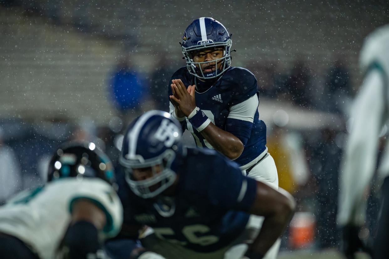 Georgia Southern true freshman quarterback Cam Ransom gets set to run a play against Coastal Carolina on Nov. 6, 2021 at Paulson Stadium in Statesboro. Ransom came off the bench in the fourth quarter and was 5-of-10 passing for 64 yards, including a 6-yard touchdown pass to tight end Beau Johnson and a two-point converson pass to Derwin Burgess Jr. Coastal Carolina, then No. 21 in the country, won 28-8.