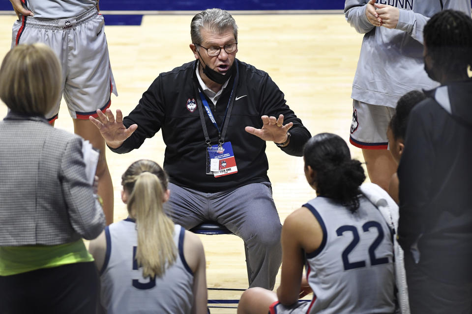 Connecticut head coach Geno Auriemma talks to his team during the second half of an NCAA college basketball game against Villanova in the Big East tournament semifinals at Mohegan Sun Arena, Sunday, March 7, 2021, in Uncasville, Conn. (AP Photo/Jessica Hill)