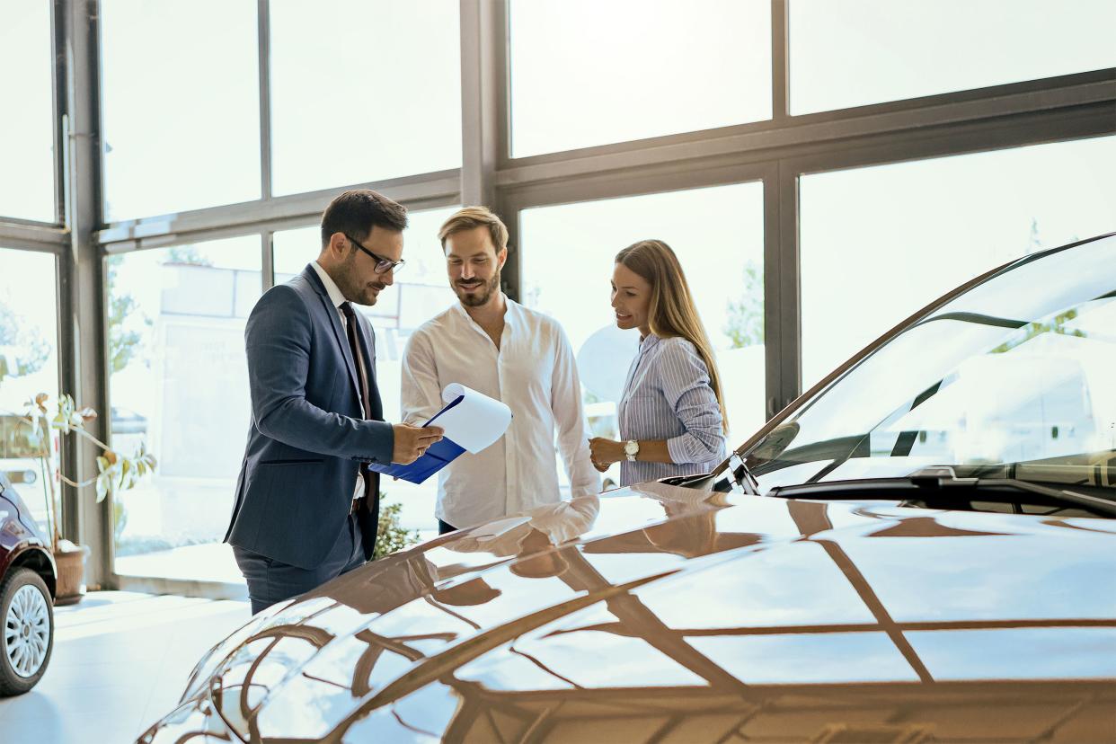 Couple buying a car