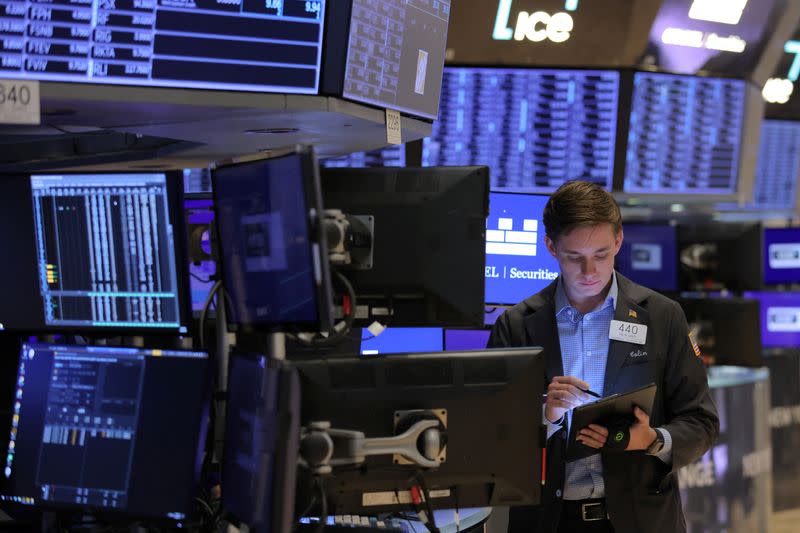 A trader works on the trading floor at the New York Stock Exchange (NYSE) in Manhattan, New York City