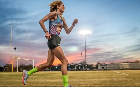 Camille Herron running around a track - Credit: Jubilee Paige