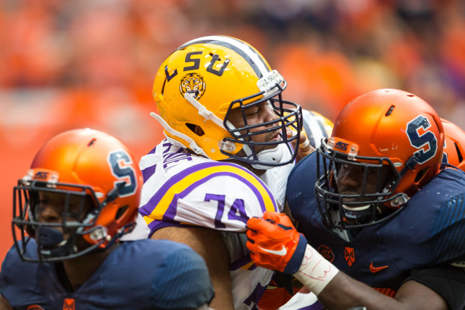 SYRACUSE, NY - SEPTEMBER 26:  Vadal Alexander #74 of the LSU Tigers blocks the Syracuse Orange during the game on September 26, 2015 at The Carrier Dome in Syracuse, New York.  LSU defeats Syracuse 34-24.  (Photo by Brett Carlsen/Getty Images)