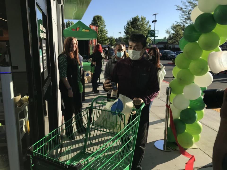 First customer enters Amazon Fresh store