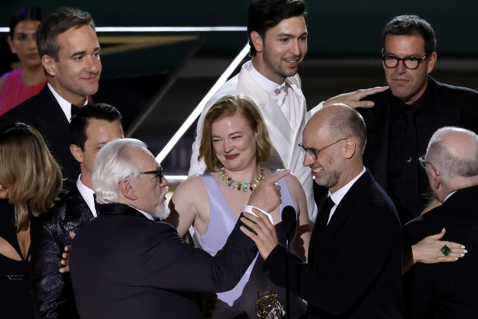 Brian Cox jokes with Succession's Jesse Armstrong on stage at the Emmy Awards. (Getty Images)