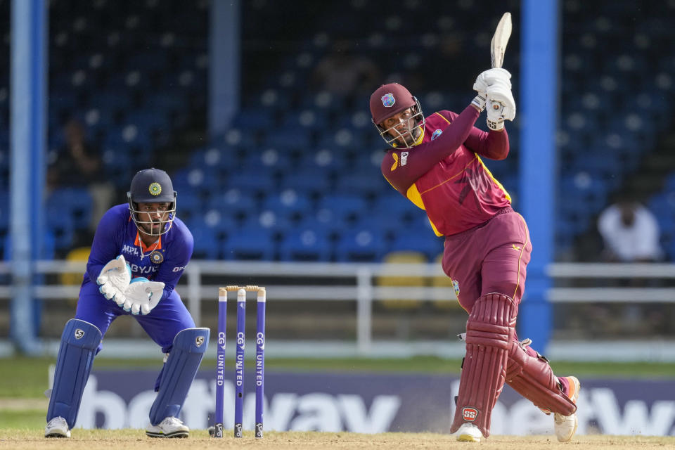 West Indies' Brandon King hits a six from a delivery of India's Axar Patel during the first ODI cricket match at Queen's Park Oval in Port of Spain, Trinidad and Tobago, Friday, July 22, 2022. (AP Photo/Ricardo Mazalan)