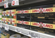 Packages of Land O' Lakes butter, a Dean Foods brand, are shown at a grocery store, Tuesday, Nov. 12, 2019, in Doral, Fla. Dean Foods, America's biggest milk processor, filed for bankruptcy Tuesday amid a steep, decades-long drop-off in U.S. milk consumption blamed on soda, juices and, more recently, nondairy substitutes. (AP Photo/Wilfredo Lee)