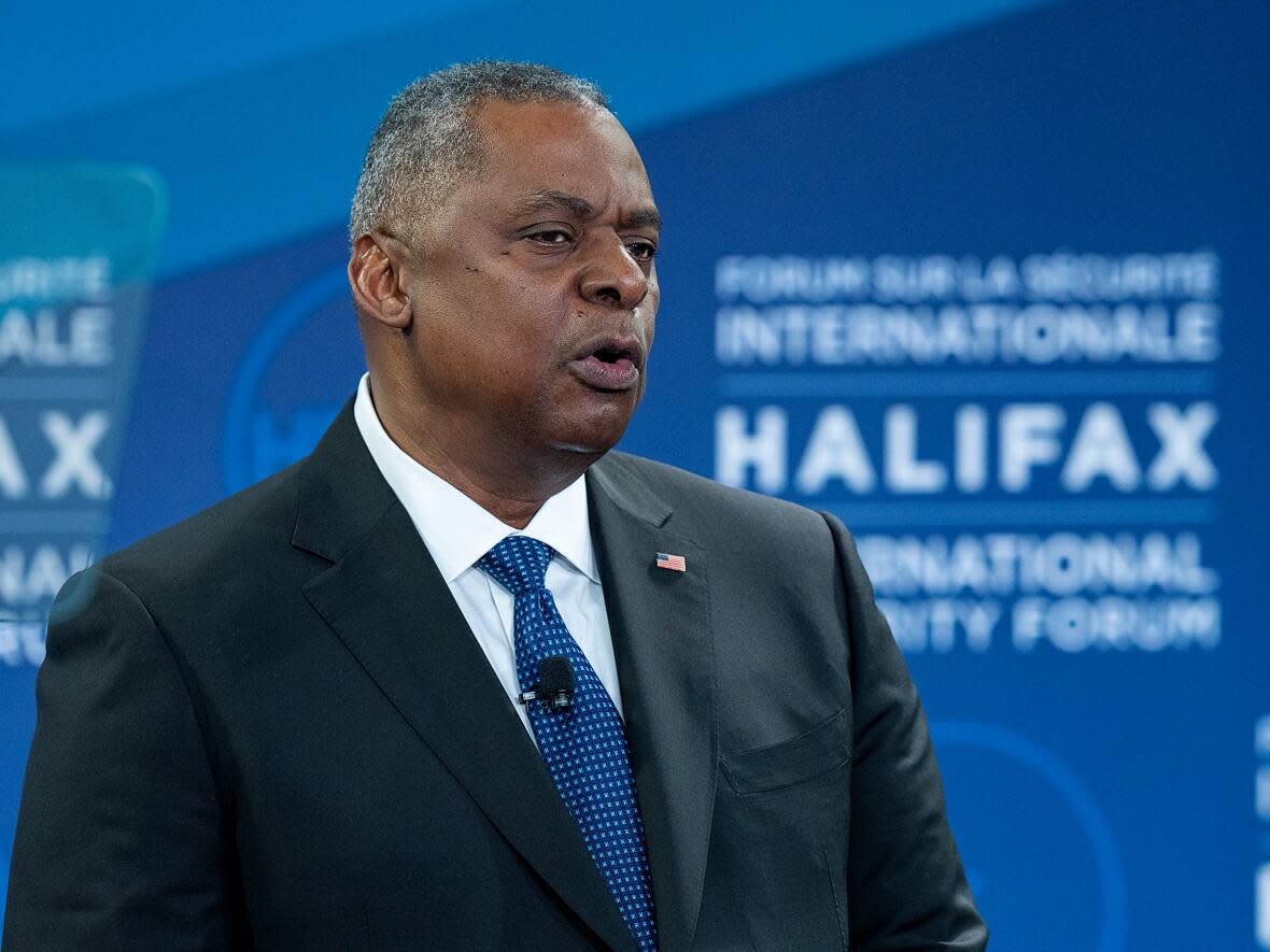 U.S. Defence Secretary Lloyd Austin delivers remarks at the Halifax International Security Forum in Halifax on Saturday. He said the nearly nine-month-old war in Ukraine following Russia's invasion on Feb. 24 has given the global community a glimpse of a possibly dark future. (Andrew Vaughan/The Canadian Press - image credit)