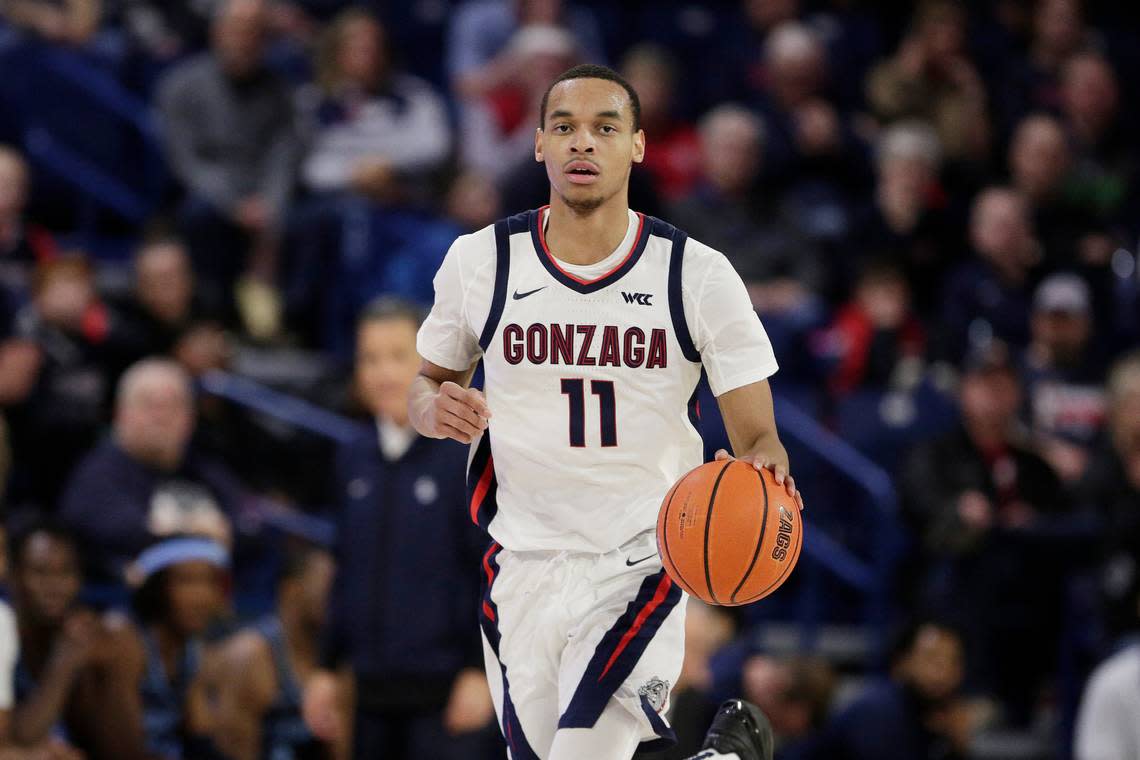 Gonzaga guard Nolan Hickman controls the ball during the second half of an NCAA college basketball game against San Diego, Thursday, Feb. 23, 2023, in Spokane, Wash. (AP Photo/Young Kwak)